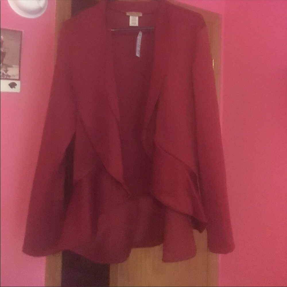 Burgundy gradually flaring out blazer.Lightly worn